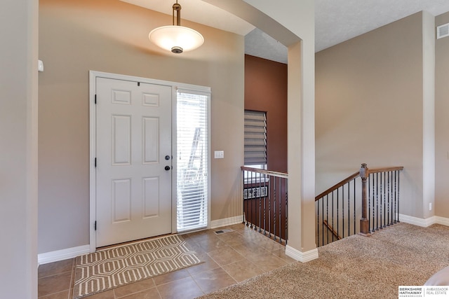 entryway featuring carpet