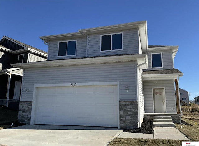 front of property featuring a garage