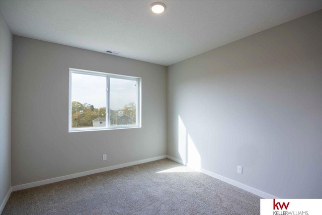 view of carpeted spare room