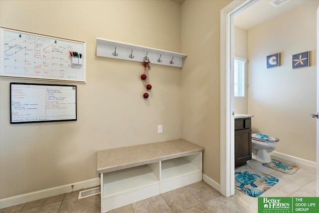 mudroom featuring light tile patterned floors