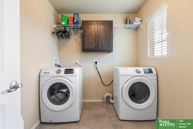 laundry area featuring cabinets, independent washer and dryer, and light tile patterned flooring