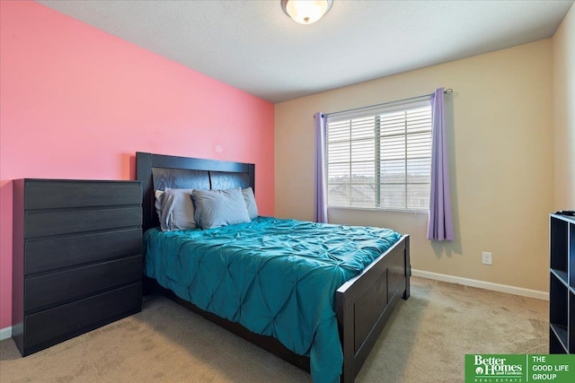 bedroom featuring light colored carpet