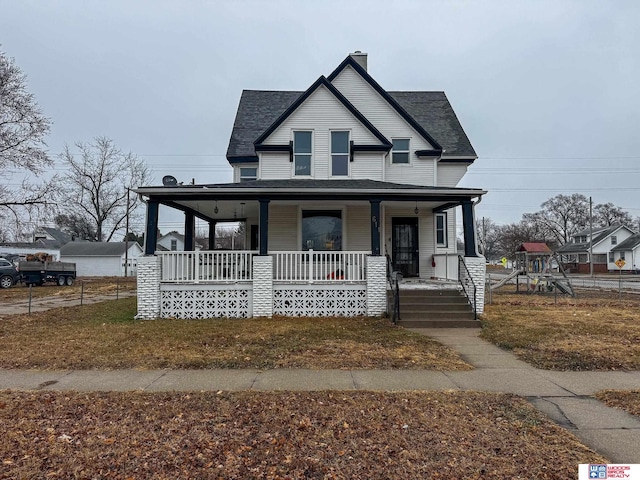 farmhouse featuring a porch