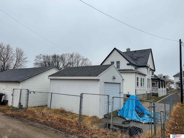 view of side of home featuring a garage