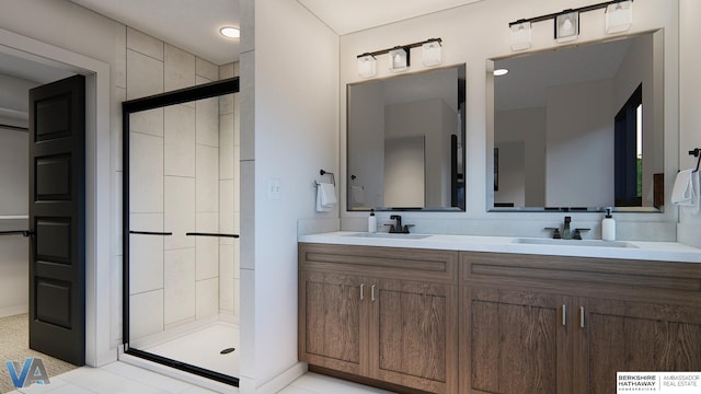 bathroom featuring a shower with door, vanity, and tile patterned flooring