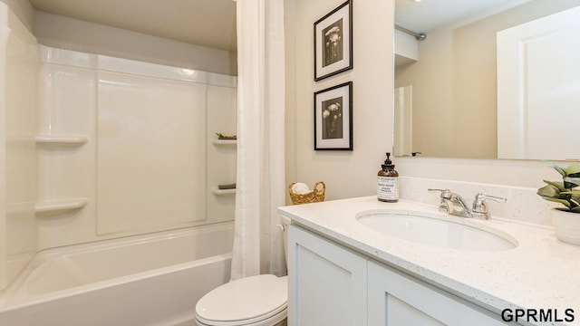 full bathroom with vanity, toilet, and shower / bathtub combination with curtain