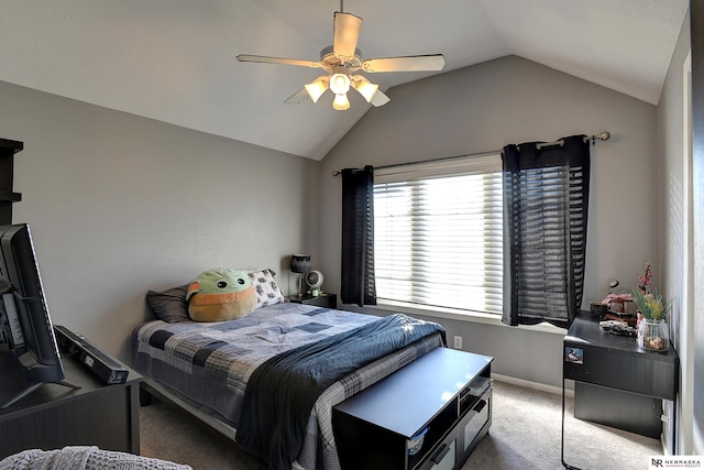 carpeted bedroom with ceiling fan and lofted ceiling