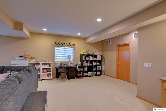 living room featuring light colored carpet