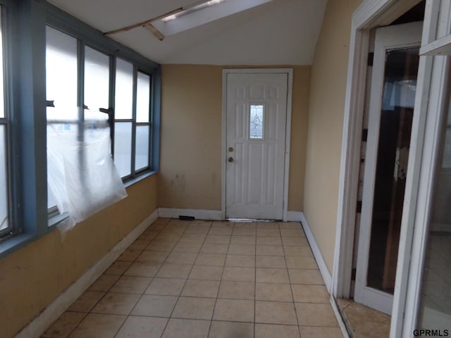 foyer with light tile patterned floors