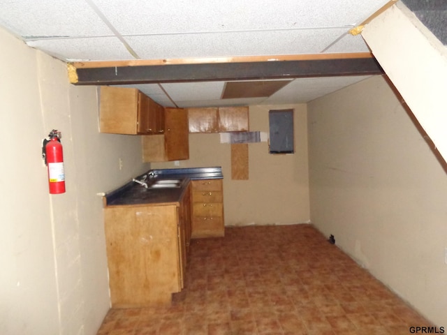 kitchen with electric panel and sink