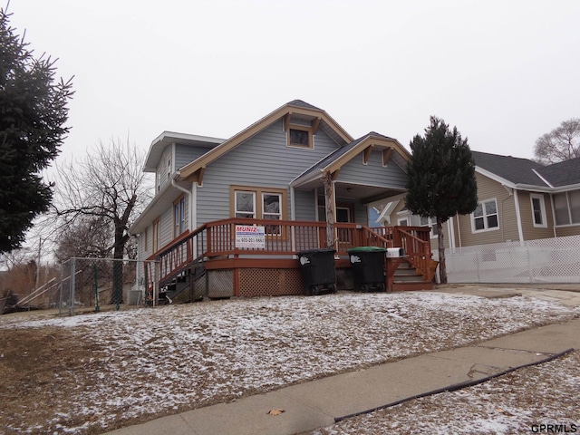 view of front of house featuring a wooden deck and central AC