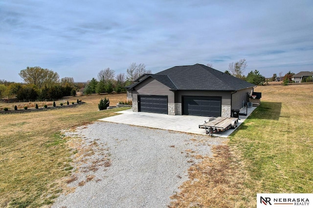 view of property exterior featuring a yard and a garage