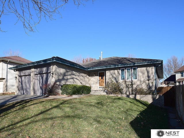 ranch-style house with a front yard and a garage