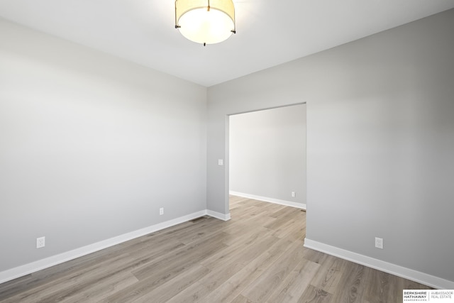 unfurnished room featuring light hardwood / wood-style floors