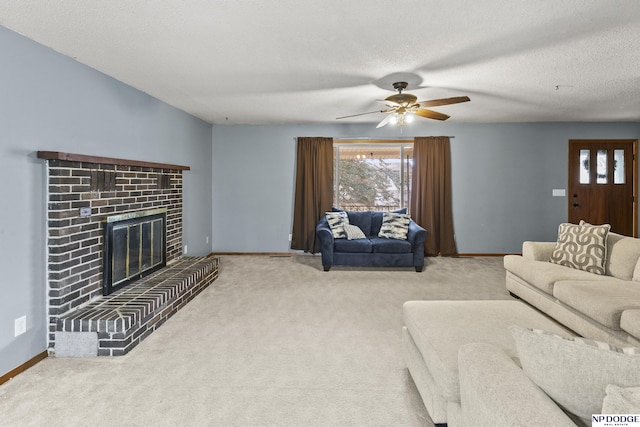 carpeted living room with a fireplace, ceiling fan, and a textured ceiling