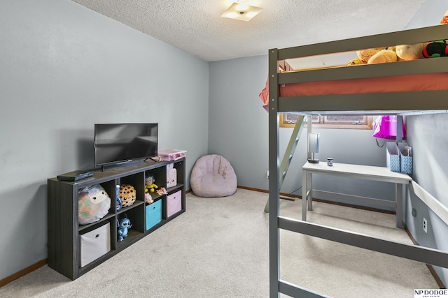 carpeted bedroom featuring a textured ceiling