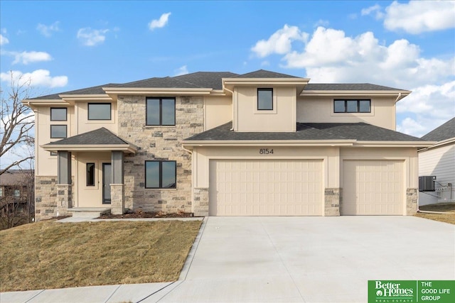 prairie-style house featuring central air condition unit, a garage, driveway, stone siding, and stucco siding