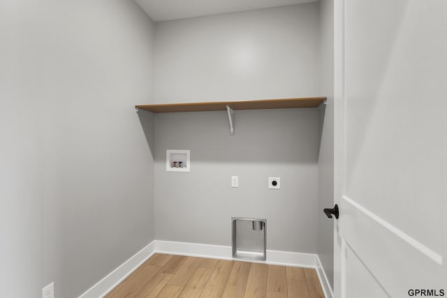 laundry room featuring hookup for an electric dryer, wood-type flooring, and washer hookup