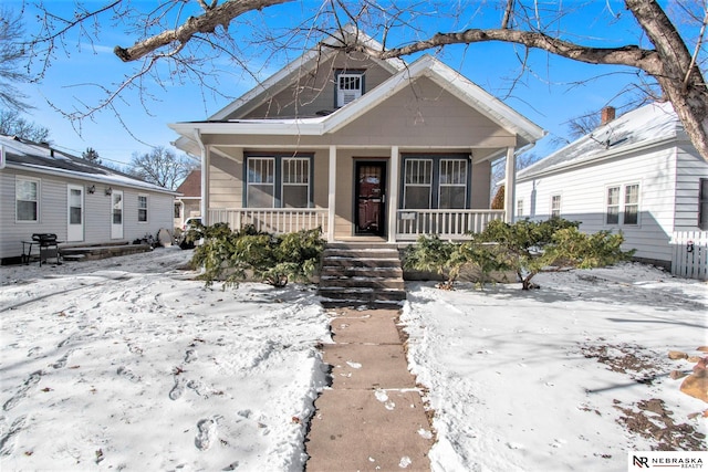 bungalow-style home featuring covered porch