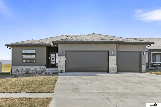 prairie-style house with a garage