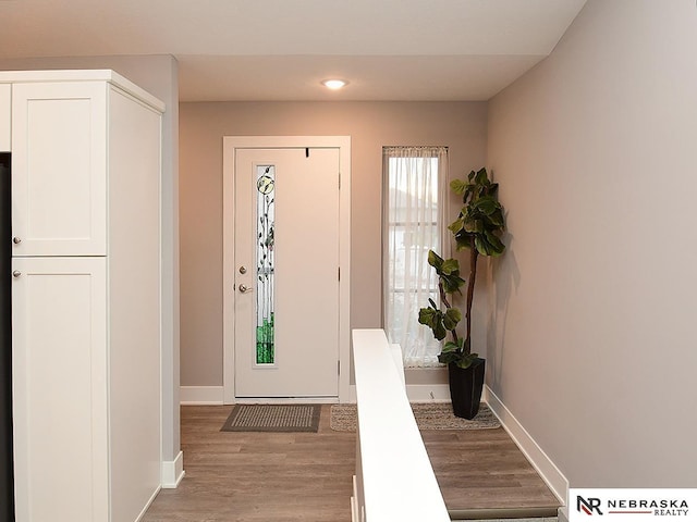 foyer featuring light hardwood / wood-style floors