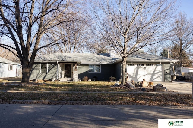 ranch-style house with a garage