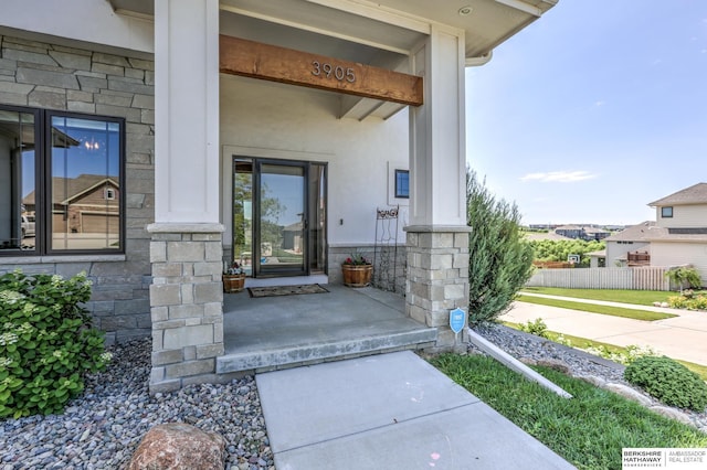 property entrance with a porch