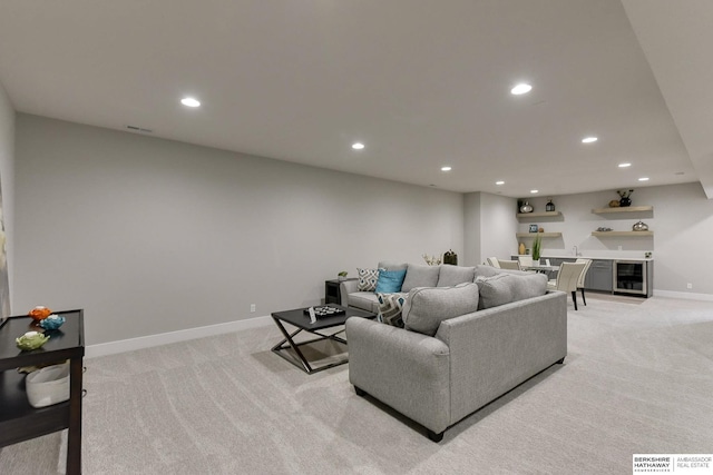 living room with light colored carpet and wine cooler