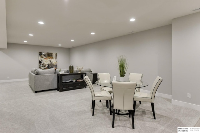 view of carpeted dining room