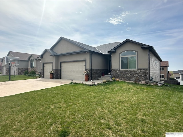 view of front of home featuring a front yard and a garage