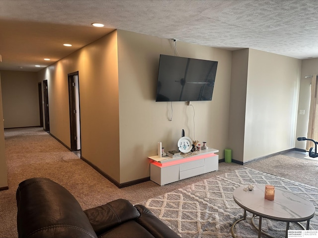 living room featuring light carpet and a textured ceiling