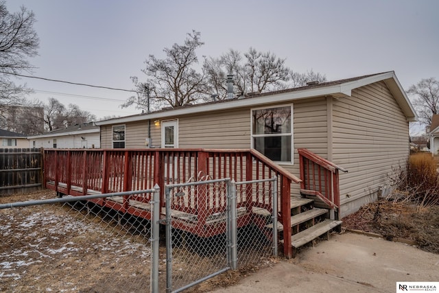 rear view of house with a deck