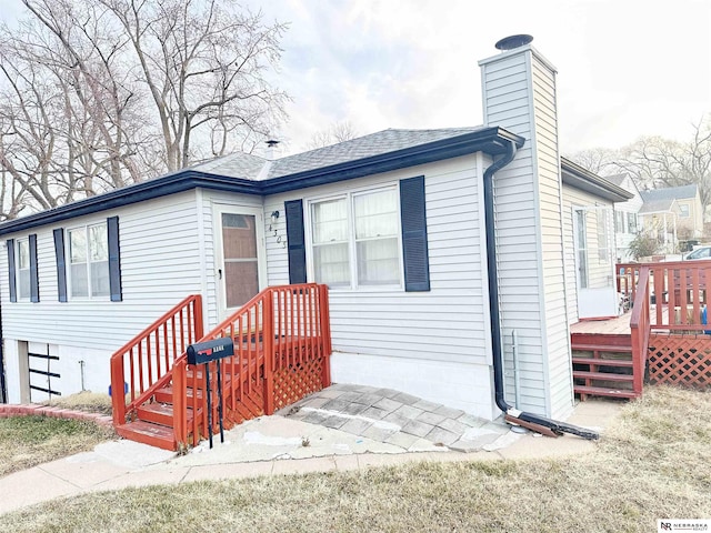 ranch-style house featuring a deck