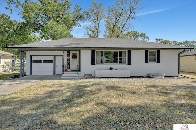 ranch-style house with a garage and a front lawn