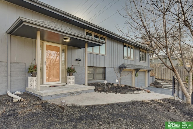 view of front of property with a garage