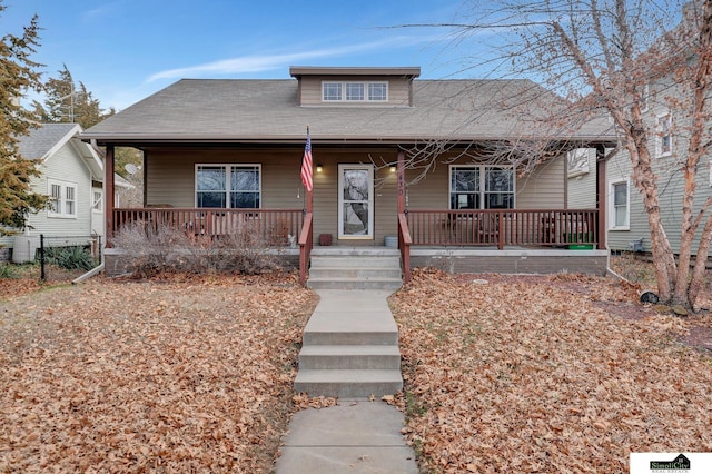 bungalow-style house featuring covered porch