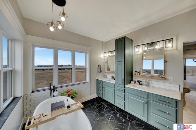 bathroom with vanity and a bathtub