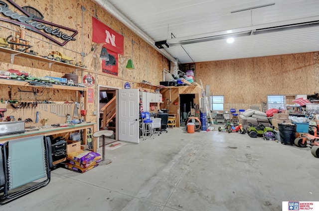 garage with a workshop area