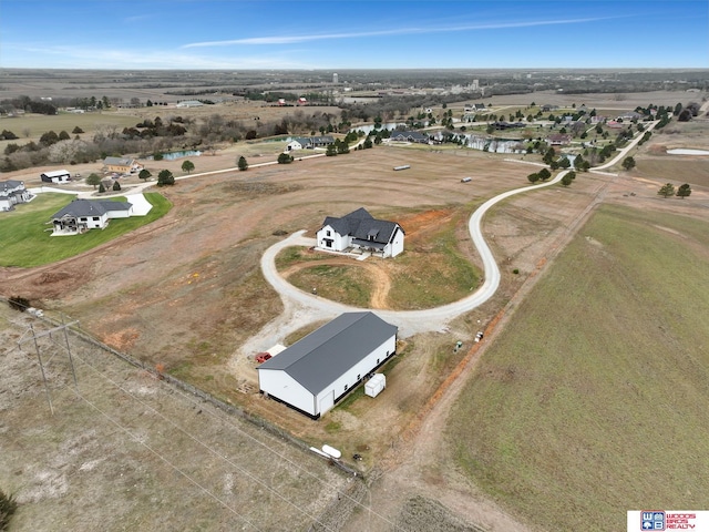 bird's eye view with a rural view