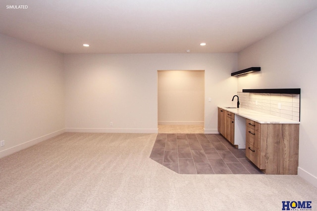 bar featuring carpet floors, baseboards, and recessed lighting