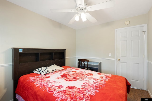 bedroom featuring ceiling fan and hardwood / wood-style flooring