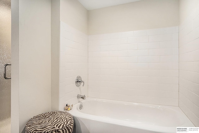 bathroom with a washtub