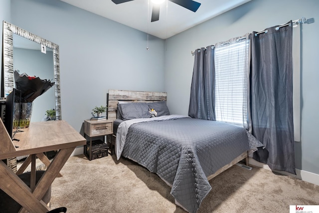 bedroom with ceiling fan and carpet