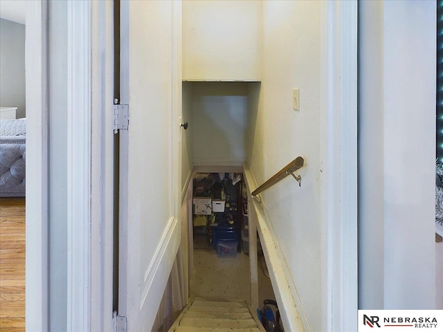 stairway with wood-type flooring