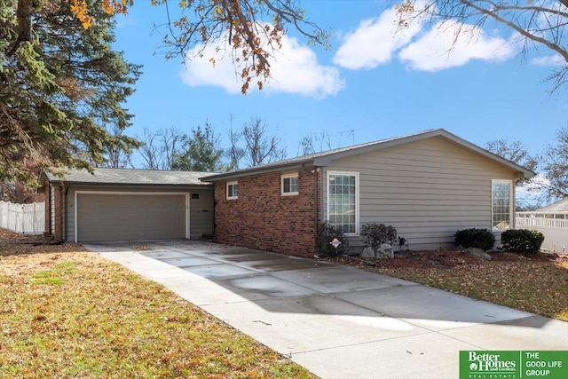 ranch-style house featuring a garage