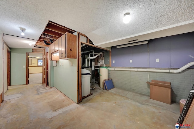 basement with a textured ceiling