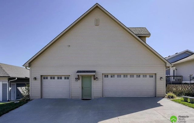 exterior space with a garage