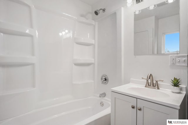 bathroom with vanity and tub / shower combination