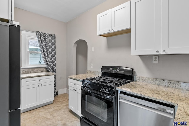 kitchen featuring white cabinets, dishwasher, refrigerator, and black gas range oven