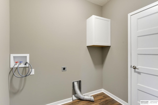 washroom featuring cabinets, hookup for a washing machine, dark hardwood / wood-style floors, and electric dryer hookup